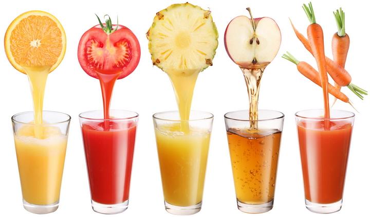 Conceptual image - fresh juice pours from fruits and vegetables in a glass. Photo on a white background.
